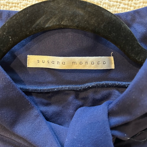 Sleeveless high neck dress with tie at neck by Susana Monaco - Picture 2 of 3